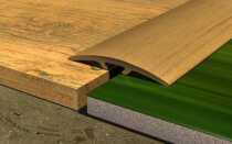 Правила выбора и монтажа гибкого порога для ламината